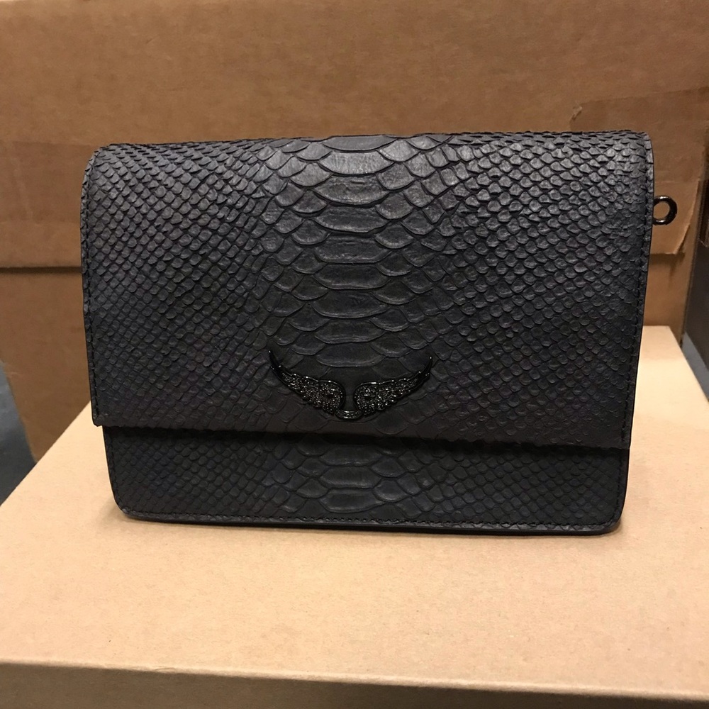 Black leather bag cross over